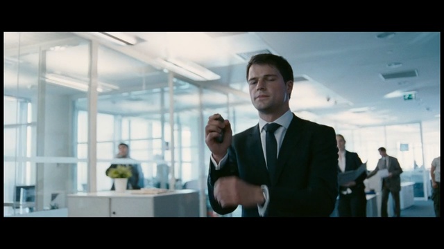 Video Reference N4: Photograph, Suit, White-collar worker, Gentleman, Snapshot, Standing, Male, Formal wear, Businessperson, Fun, Person, Man, Indoor, Photo, Screen, Monitor, Front, Window, Holding, Wearing, Television, Table, Woman, Large, Room, People, Display, White, Wedding, Screenshot, Clothing, Human face, Tie, Text