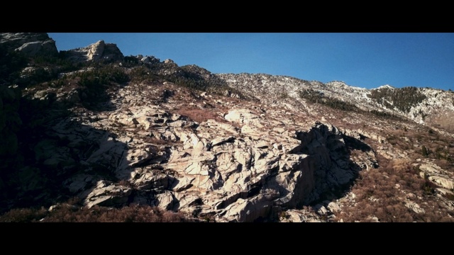 Video Reference N12: rock, ridge, mountain, sky, wilderness, geological phenomenon, geology, fault, bedrock, outcrop
