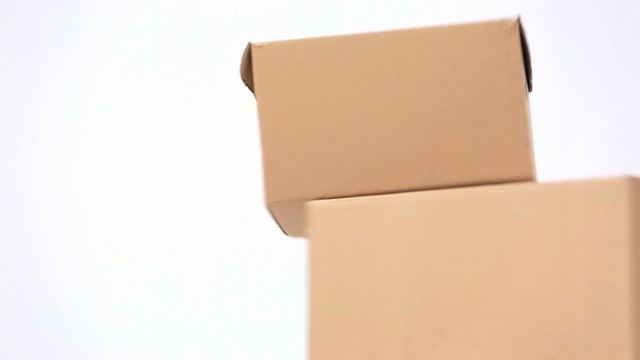 Video Reference N5: Box, Beige, Shipping box, Cardboard, Material property, Rectangle, Paper product, Paper, Packaging and labeling, Carton