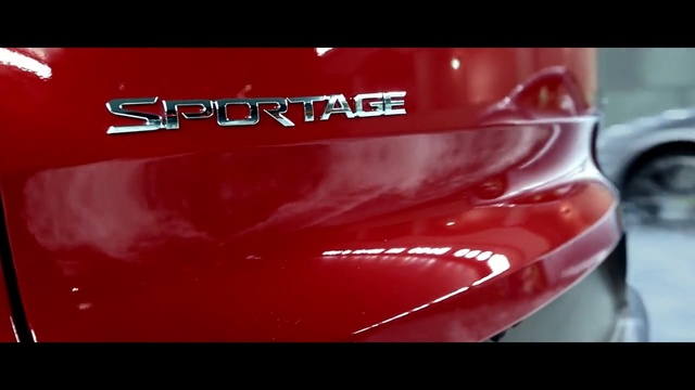 Video Reference N1: car, red, motor vehicle, automotive design, auto show, automotive lighting, mode of transport, vehicle, automotive exterior, vehicle registration plate
