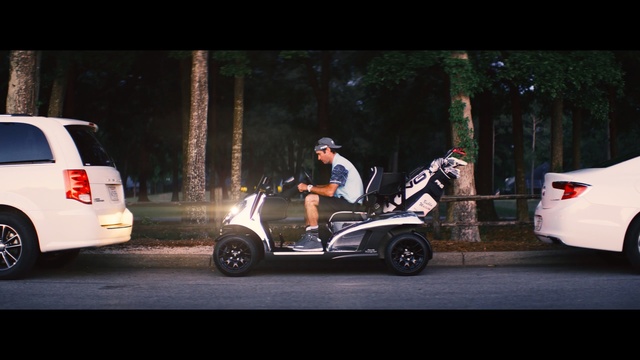 Video Reference N1: car, motor vehicle, vehicle, mode of transport, automotive design, automotive wheel system, wheel, golf cart, scooter, automotive exterior