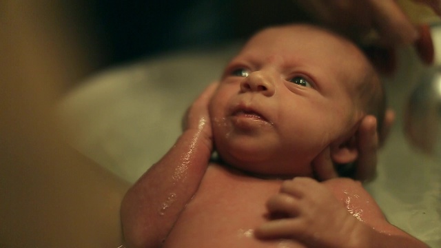 Video Reference N3: Child, Face, Baby, Skin, Cheek, Bathing, Nose, Close-up, Eye, Lip