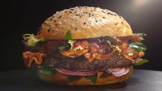 Video Reference N10: hamburger, veggie burger, sandwich, cheeseburger, buffalo burger, dish, salmon burger, fast food, food, finger food