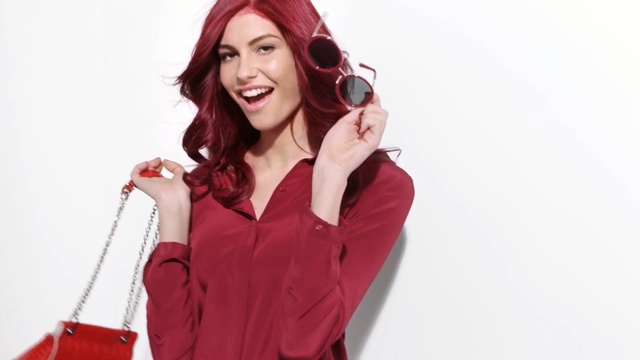 Video Reference N1: Red, Outerwear, Hoodie, Fashion model, Smile, Photography, Jacket, Singer, Photo shoot, Sleeve, Person