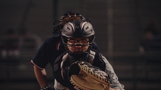 Video Reference N20: Sports gear, Helmet, Catcher, Baseball glove, Personal protective equipment, Baseball, Player, Sports equipment, Softball, Team sport