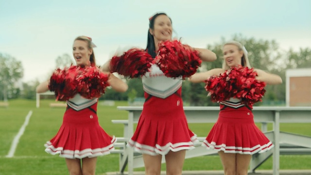 Video Reference N0: red, cheerleading, flower, cheering, grass, spring, fun, team, bridesmaid, girl, Person