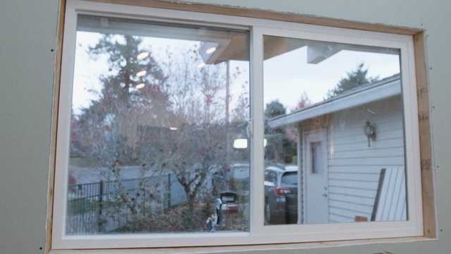 Video Reference N4: window, property, home, sash window, house, door, real estate, siding, window screen, facade, Person