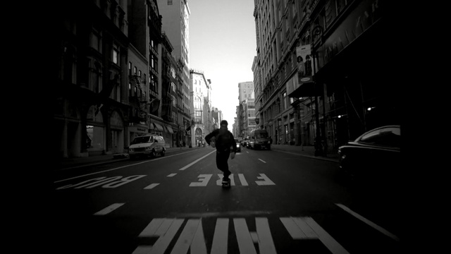 Video Reference N2: black, lane, black and white, road, urban area, street, metropolis, monochrome photography, infrastructure, sky, Person