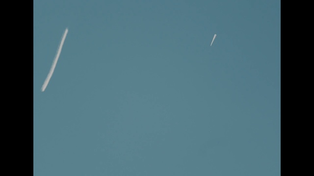 Video Reference N1: sky, blue, atmosphere, daytime, line, cloud, font, space, crescent, triangle