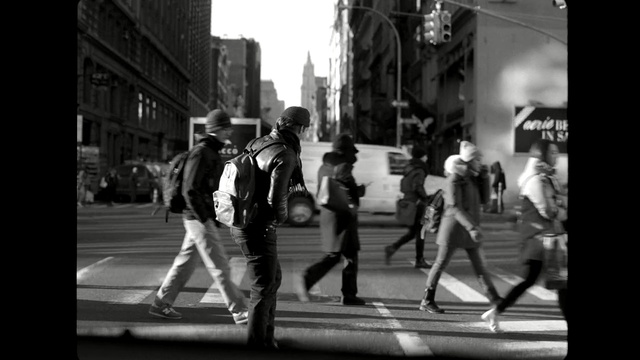 Video Reference N5: white, black, photograph, black and white, street, man, urban area, road, monochrome photography, infrastructure, Person