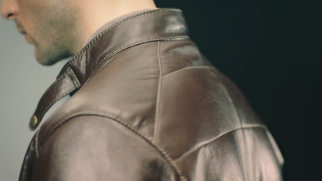 Video Reference N0: jacket, textile, outerwear, leather, material, neck, top