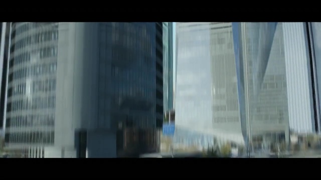 Video Reference N1: skyscraper, metropolis, urban area, building, landmark, sky, mode of transport, architecture, city, tower block, Person