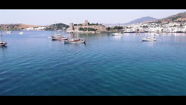 Video Reference N4: Body of water, Water, Sea, Sky, Boat, Harbor, Marina, Vehicle, Calm, Boating