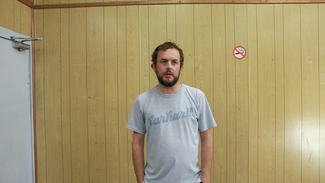 Video Reference N2: T-shirt, Standing, Shoulder, Door, Wood, Facial hair, Person