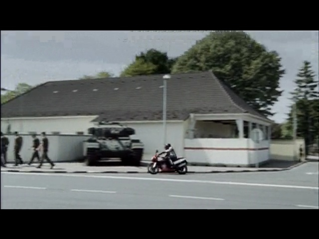 Video Reference N4: Vehicle, Motor vehicle, Mode of transport, House, Motorcycle, Residential area, Home, Tree, Asphalt, Architecture