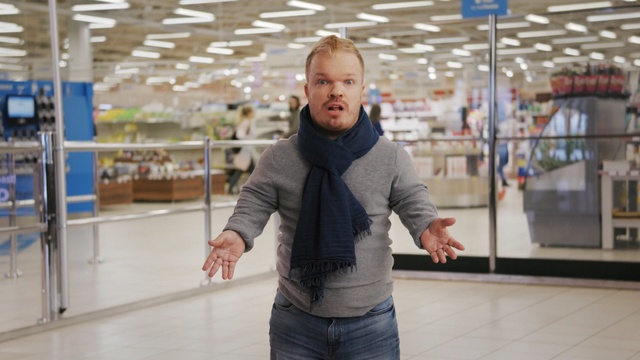 Video Reference N3: Standing, Fun, Supermarket, Smile, Retail, Building, Shopping mall, Vacation, Gesture, Jacket, Person