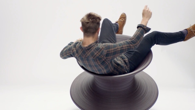 Video Reference N1: Sitting, Arm, Fun, Automotive wheel system, Hand, Wheel, Furniture, Sculpture, Balance, Art