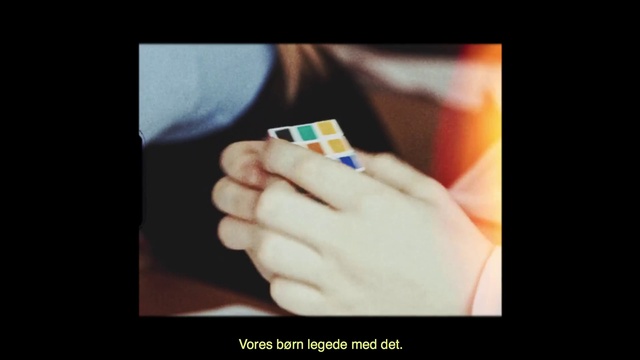 Video Reference N0: Finger, Hand, Text, Skin, Rubiks cube, Nail, Thumb, Font, Human, Photography