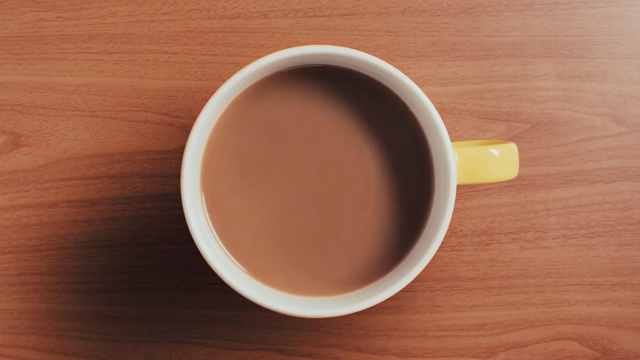 Video Reference N3: cup, coffee cup, cup, tableware, coffee, caffeine, tea, serveware, coffee milk, cuban espresso