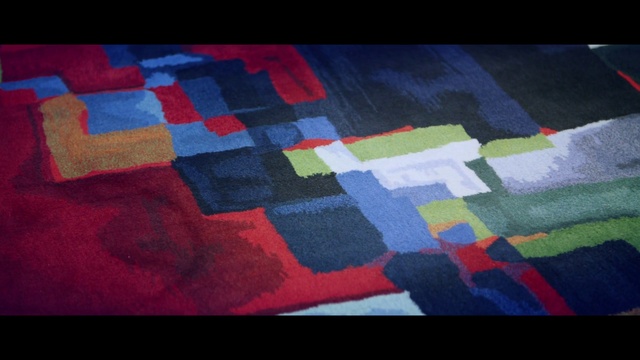 Video Reference N2: Blue, Photograph, Product, Turquoise, Textile, Red, Light, Pattern, Patchwork, Azure, Indoor, Colorful, Small, Child, Kite, Colored, Blanket, Rug, Girl, Sitting, Bed, Little, Painted, Holding, Room, Young, Laying, Yellow, Man, White, Floor, Quilt, Quilting, Mat