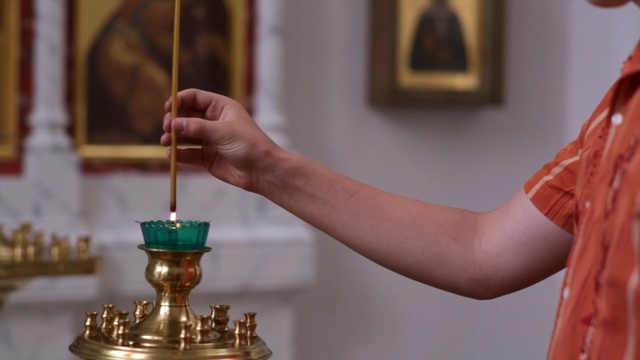 Video Reference N4: Hand, Metal, Brass, Pray, Candle, Finger, Ritual, Interior design, Person