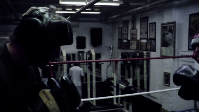 Video Reference N2: Boxing ring, Sport venue, Gym, Physical fitness, Room, Boxing, Photography, Boxing equipment, Person
