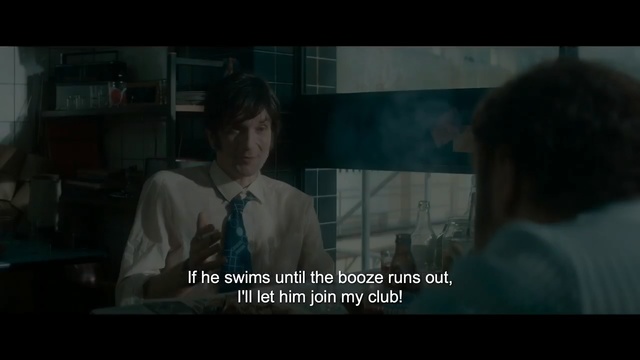 Video Reference N1: Movie, Screenshot, Darkness, Human, Scene, Photo caption, Conversation, Fun, Fictional character, Font, Person