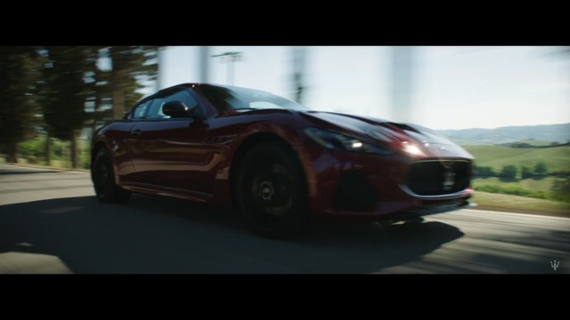 Video Reference N3: car, motor vehicle, auto, sports car, automobile, vehicle, speed, transportation, coupe, wheel, drive, fast, luxury, transport, motor, sports, sport, power, tire, modern, headlight, race, road, style, bumper, chrome, driving, design, model, expensive, shiny, wheeled vehicle, wheels, new, engine