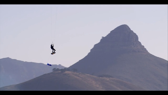 Video Reference N22: Extreme sport, Sky, Flip (acrobatic), Mountain, Recreation, Terrain, Summit, Air sports