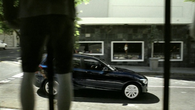 Video Reference N2: car, land vehicle, motor vehicle, vehicle, road, bmw, transport, mode of transport, luxury vehicle, street, Person