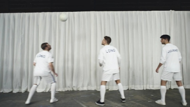 Video Reference N6: white, man, shoulder, male, standing, t shirt, joint, uniform, team, competition event