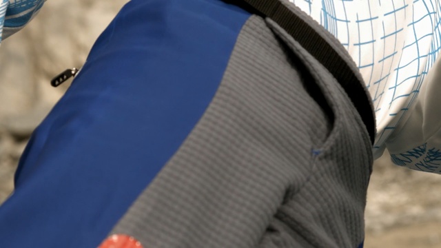 Video Reference N1: blue, electric blue, cobalt blue, jacket, outerwear, shoulder, sleeve, product, t shirt, top, Person