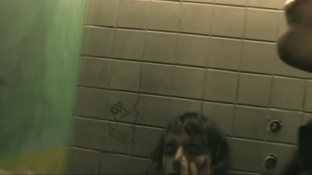 Video Reference N0: hair, green, black, photograph, mammal, wall, room, mode of transport, snapshot, floor