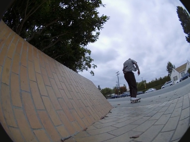 Video Reference N3: Skateboarding, Fisheye lens, Boardsport, Skateboarder, Photography, Freebord, Kickflip, Recreation, Skateboard, Skateboarding equipment, Outdoor, Man, Person, Riding, Ramp, Snow, Board, Building, Young, Side, Hill, Boy, Trick, Brick, Park, Jumping, Slope, Doing, Air, Covered, Standing, Sky, Tree, Footwear, Skating, Clothing, Trousers