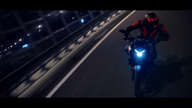 Video Reference N2: Motorcycling, Motorcycle, Automotive lighting, Automotive design, Vehicle, Headlamp, Mode of transport, Light, Wheel, Darkness