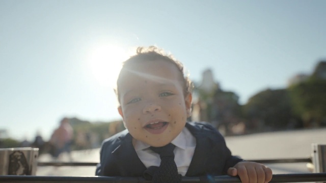 Video Reference N4: Child, Head, Sky, Toddler, Photography, Vacation, Sitting, Smile