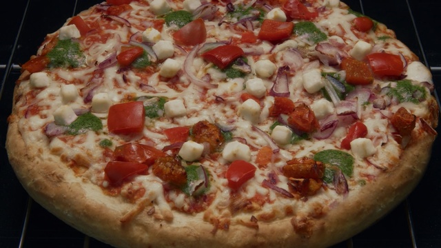 Video Reference N8: pizza, dish, cuisine, italian food, california style pizza, food, pizza cheese, european food, sicilian pizza, flatbread