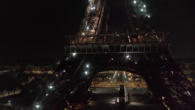 Video Reference N0: Night, Sky, Vehicle, Midnight, Luxury vehicle, Architecture, Darkness, City, Mid-size car, Car, Outdoor, Building, Water, Large, Going, Light, Street, Bridge, Snow, View, Dark, Lit, Traveling, Driving, Standing, Clock, Traffic, Tall, Boat, Tower, Train, Room, Man, Skyscraper, Ship
