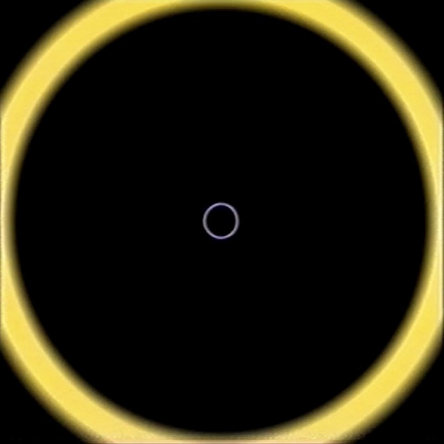 Video Reference N0: yellow, circle, atmosphere, computer wallpaper, font, eclipse, sky