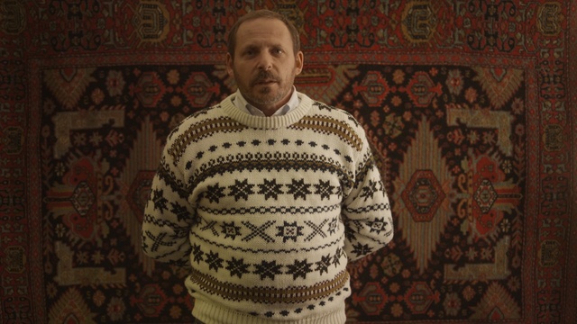 Video Reference N1: textile, facial hair, pattern, material, art, knitting, Person