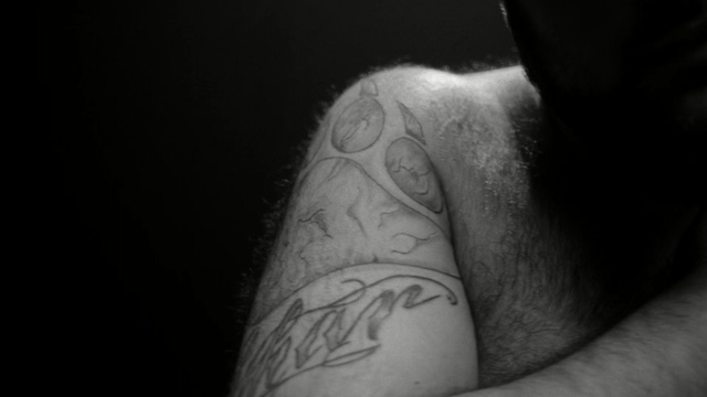 Video Reference N1: Tattoo, Arm, Shoulder, Skin, Joint, Black-and-white, Leg, Flesh, Hand, Human body