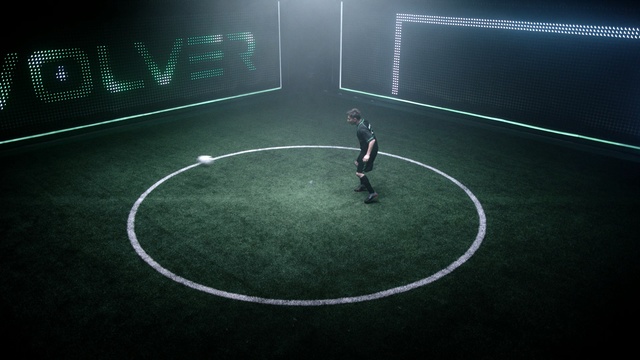 Video Reference N3: green, sport venue, atmosphere, football, player, light, structure, ball, line, grass
