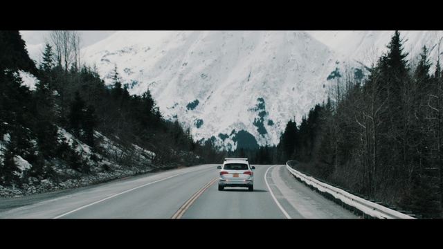 Video Reference N2: road, car, highway, nature, snow, tree, woody plant, mountainous landforms, sky, winter