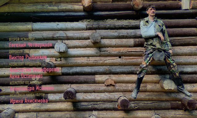Video Reference N2: Wood, Log cabin, Building, Fence, Wooden, Bench, Sitting, Woman, Truck, Park, Pile, Man, Old, Standing, Holding, Brown, Parked, Large, Cutting, Dirty, Group, Board, Stacked, People, Baseball, Footwear, Stack