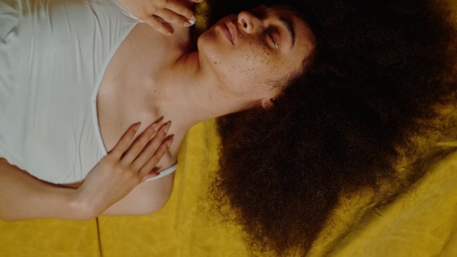 Video Reference N1: yellow, skin, forehead, mouth, girl, black hair, arm, neck, muscle, romance