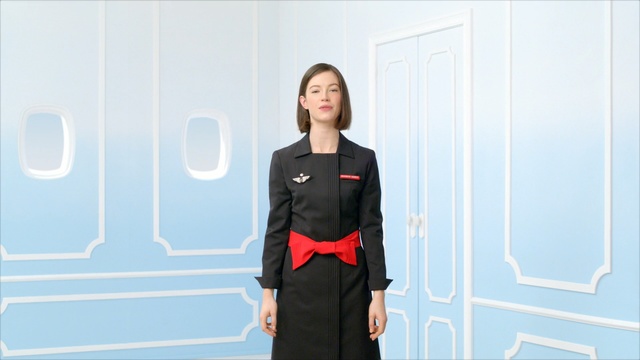Video Reference N0: clothing, shoulder, standing, dress, outerwear, uniform, costume, joint, dobok, robe, Person