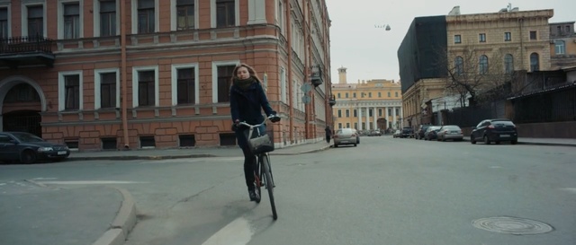 Video Reference N9: Bicycle, Vehicle, Cycling, Lane, Mode of transport, Snapshot, Recreation, Street, Town, Cycle sport, Person