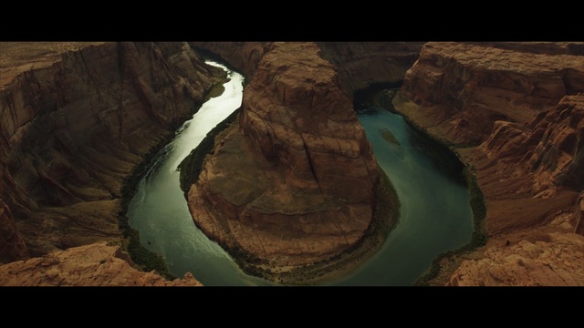 Video Reference N0: canyon, rock, formation, geology, screenshot, earth, landscape, water, aerial photography, computer wallpaper
