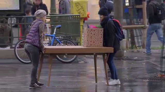 Video Reference N9: Snapshot, Mode of transport, Human, Table, Photography, Furniture, Vehicle, Conversation, Games, Pedestrian