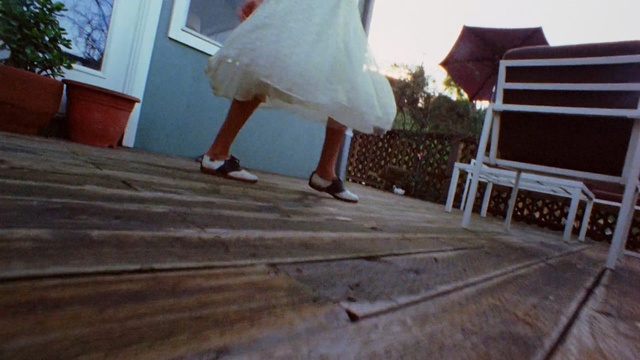 Video Reference N1: White, Photograph, Dress, Floor, Hardwood, Footwear, Leg, Wedding dress, Wood, Wood flooring